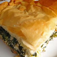 Spinach Pie · Spinach and feta cheese stuffed into a crispy, flaky imported greek phyllo dough.