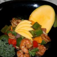 Mango Shrimp · Sautéed shrimp with asparagus, red and green peppers, mango, onion and cilantro in mango sau...