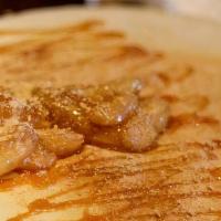 Apple Pie Crepe · Melted caramel, warm sweet apples, and graham cracker crumbs.