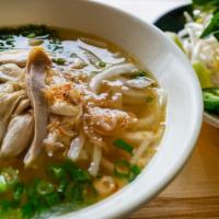 Pho Ga · Vietnamese chicken noodle soup for the soul featuring gluten-free rice noodles, fresh shredd...