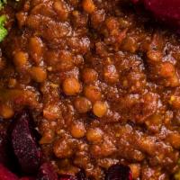 Misir Wot (Warm) · Red lentils cooked with spicy berbere sauce.