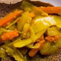 Yatakilt Alicha (Warm) · Cabbage, potatoes, carrots, and turmeric.