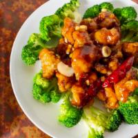H 1. General Tso'S Chicken · Golden tender chicken morsels w. A delightful spicy sauce. Hot & spicy sauce.