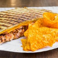 Chicken Fajita Panini · Grilled chicken, cheddar cheese, roasted peppers, caramelized onions, and salsa on European ...