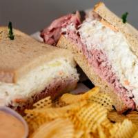 Sloppy Jim · Oven Gold Roasted Turkey, Roast Beef, Coleslaw, and Russian Dressing on Rye bread