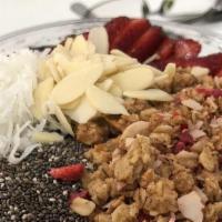 Detox Tropical Bowl · Banana, strawberry, mango and charcoal powder. Topped with granola, chia, sliced almonds and...