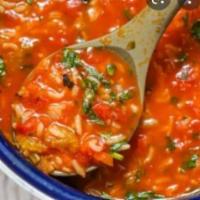 Tomato Basil & Rice Soup · Favorite. Tomato purée, onions, white rice, sugar, garlic, basil, salt, black oil and olive ...