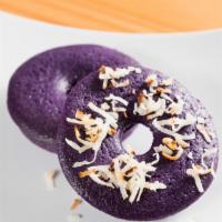Cake Donut - Ube Purple Yam · Our signature Baked Ube Purple Yam Donut glazed with Coconut Ube & sprinkle with toasted des...
