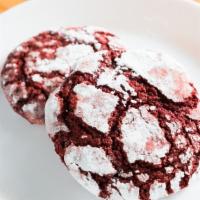Red Velvet Crinkle Cookie · Soft & Chewy Crinkle Cookie covered with powdered sugar