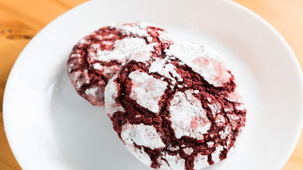 Red Velvet Crinkle Cookie · Soft & Chewy Crinkle Cookie covered with powdered sugar