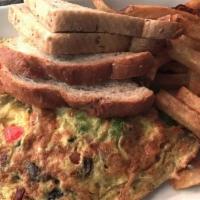 California Omelette · Avocado, mushrooms, tomatoes and cheddar cheese. Served with choice of potatoes and toast.
