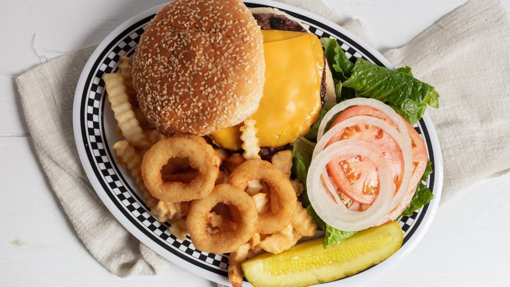 Cheese Burger · Deluxe burger served with French fries, Sweet potato fries, or waffle fries, onion rings, lettuce, tomato, coleslaw & pickle.