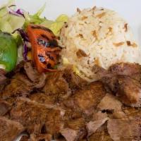 Doner Gyro · Ground lamb wrapped around a large vertical spit and grilled in front of an ingenious tier o...