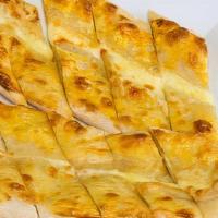 Cheese Pie · Dough filled with Turkish kashar cheese.