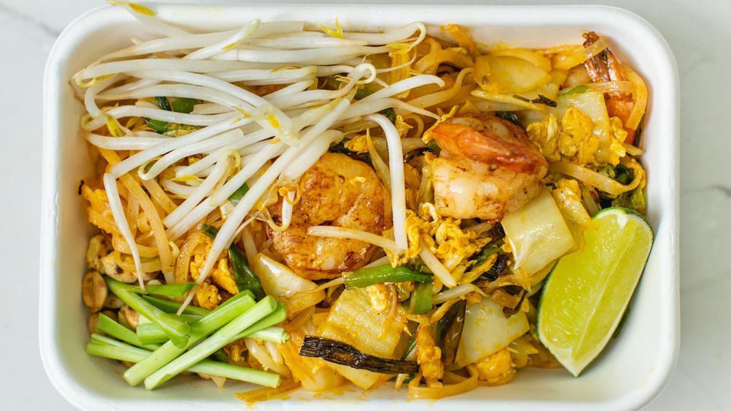 Pad Thai Noodles (Seafood) · Shrimp, squid, Napa cabbage, Chinese chives, roasted peanuts, tofu, bok choy, and eggs.