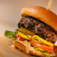 Classic Beef Burger · House-blend Asian style half-a-pounder burger, sriracha-honey mayo, lettuce, tomato, pickled...