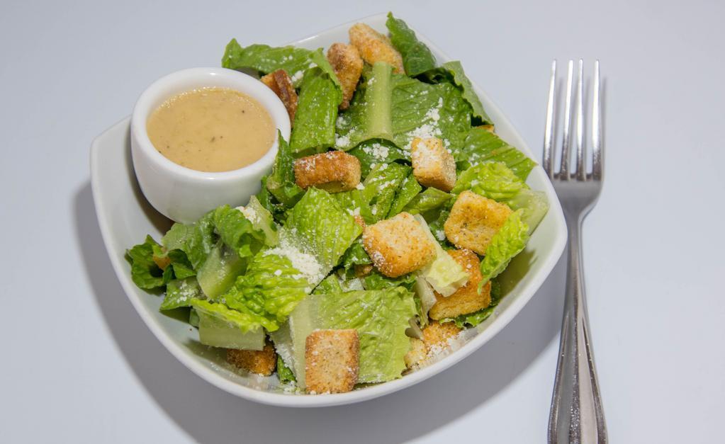 Caesar Salad · Romaine lettuce, croutons and sprinkled with pecorino Romano cheese. Dressing served on the side.