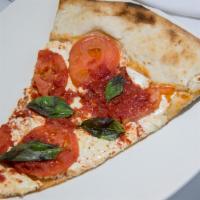 Margherita Pizza · Fresh mozzarella, fresh tomatoes and basil.