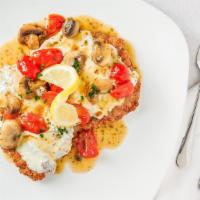 Chicken Or Veal Marvin · Pan sauteed breaded cutlet with melted fresh mozzarella, mushrooms and tomatoes in a white w...