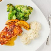 Salmon · Pan seared with an orange-cranberry glaze. Served with garlic mashed potatoes and broccoli.