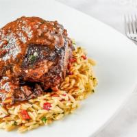 Osso Bucco · Served over orzo pasta