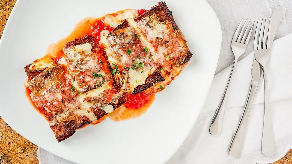 Eggplant Rollatini · Baked with cheese.