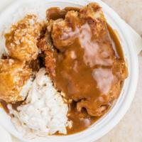 Boneless Chicken With Gravy · Tender, boneless chicken thighs seasoned, breaded and fried golden brown on our griddle, top...