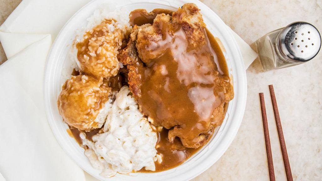 Boneless Chicken With Gravy · Tender, boneless chicken thighs seasoned, breaded and fried golden brown on our griddle, topped with our special gravy.