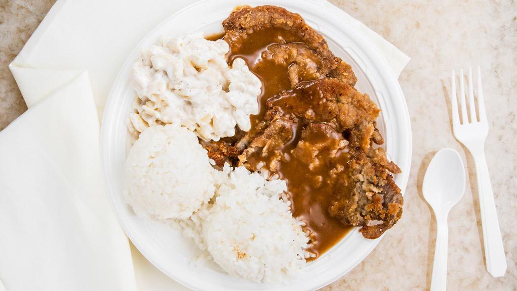 Pork Cutlet With Gravy · Thinly sliced pork, seasoned, breaded and fried golden brown, served with our special gravy.