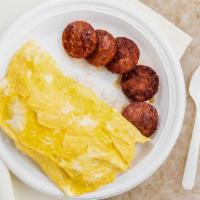 2 Egg Breakfast · With choice of meat (Portuguese sausage, bacon or spam).