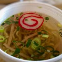 Saimin · Oriental noodles served in a flavorful soup broth, garnished with green onion, kamaboko and ...