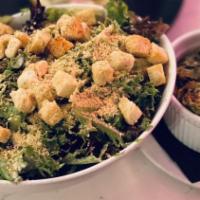 Caesar Salad · Cashew Parmesan, Crispy Capers, and Herbed Croutons.