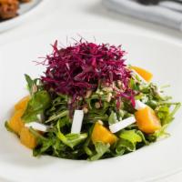 Golden Beet Salad  · Golden beets with baby arugula, vegan feta cheese, toasted sunflower seeds, and herbs with b...