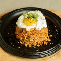 Kimchi Fried Rice · Kimchi Fried Rice with a fried egg on top. Spicy.