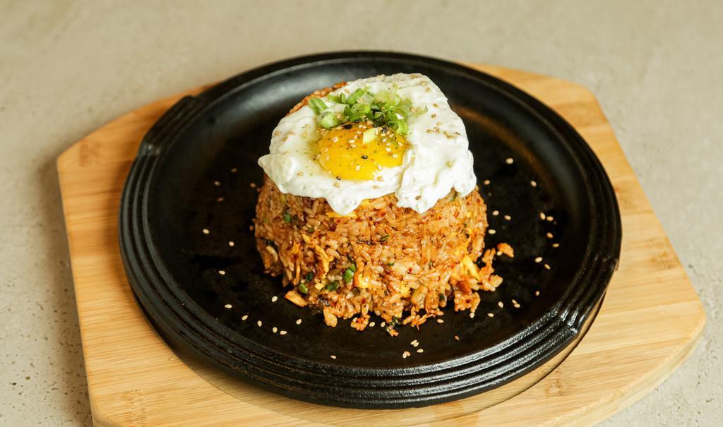 Kimchi Fried Rice · Kimchi Fried Rice with a fried egg on top. Spicy.