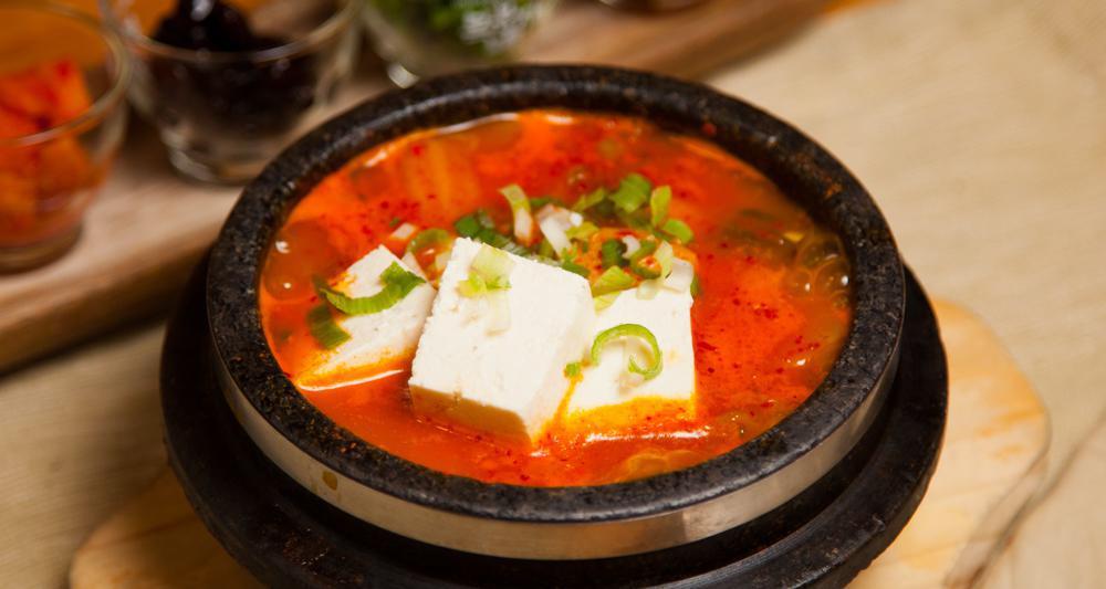 Kimchi Stew · Most popular, spicy. Kimchi soup with vegetables, tofu and pork. Served with rice.