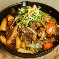 Beef Galbi Jjim · Beef ribs and vegetables in house soy sauce or sweet chili sauce. serve with 2 rices