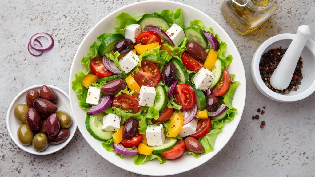 Israeli Salad · Colorful and flavorful salad made with finely diced tomato, onion, cucumber, and bell or chili peppers and dressed perfectly.