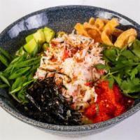 Kani Salad · Delicious salad with shredded imitation crab (kani) with cucumber and spicy mayonnaise, topp...
