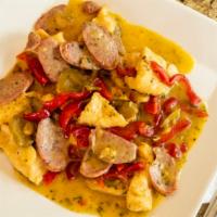 Chicken Scarpariello · Sauteed chicken with sausage in a white wine sauce with peppers (hot or sweet).
