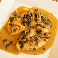 Chicken Marsala · Breast of chicken in a marsala wine sauce with sauteed mushrooms.