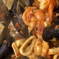 Mussels Entree · Mussels in a white wine tomato sauce (or fra diavolo).