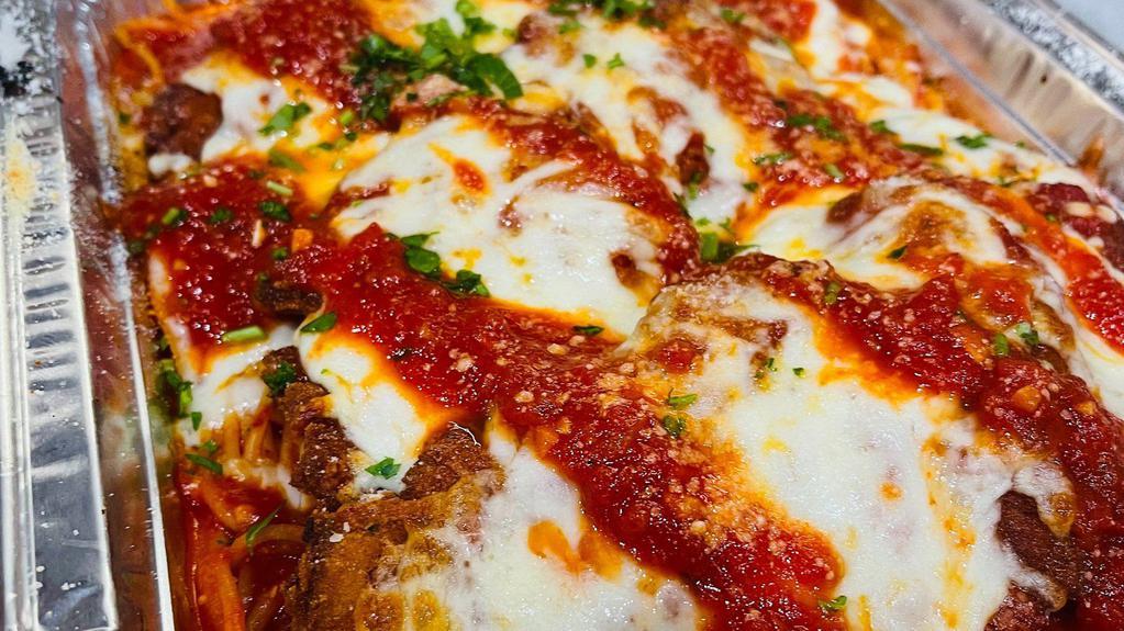 Half Tray Chicken Parmesan Over Spaghetti ! · Juicy chicken smothered with marinara served over a whole pound of pasta! Delicious