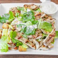 Caesar Salad · Iceberg lettuce, Parmesan cheese, croutons & Caesar dressing.