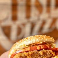 Crispy Chicken Burger · Battered  chicken breast, lettuce, tomato, topped with our famous spicy Mayo. served with si...