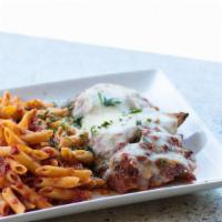 Veal Parmigana · Breaded veal cutlet smothered in tomato sauce & covered generously with mozzarella, served w...