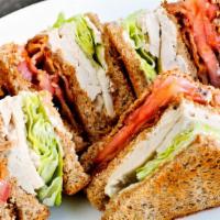 Turkey Club · Bacon, Lettuce, Tomato, and Mayo.Comes With French Fries