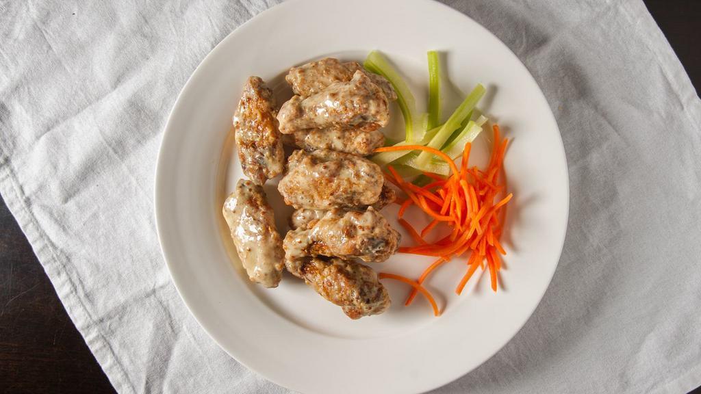 Dusted Chicken Wings · Fried and tossed with classic Affy's bbq sauce or honey mustard sauce or buffalo sauce or hot sauce or teryaki sauce, accompanied with carrot and celery.