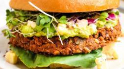 Vegan California Burger · Impossible Burger patty with vegan cheese, avocado, lettuce, tomato, pickles, and vegan mayo...