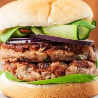 Vegan Mushroom Burger · Impossible Burger patty vegan cheese, mushrooms, caramelized onions, and vegan mayo on a toa...